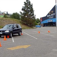 Hitting the cones is not a bad thing. It teaches you where your vehicle is in relation to other objects on the road.