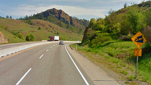 Semi-trucks will slow down on hills. Most will activate their 4-way flashers if travelling less than 40mph (70kph).