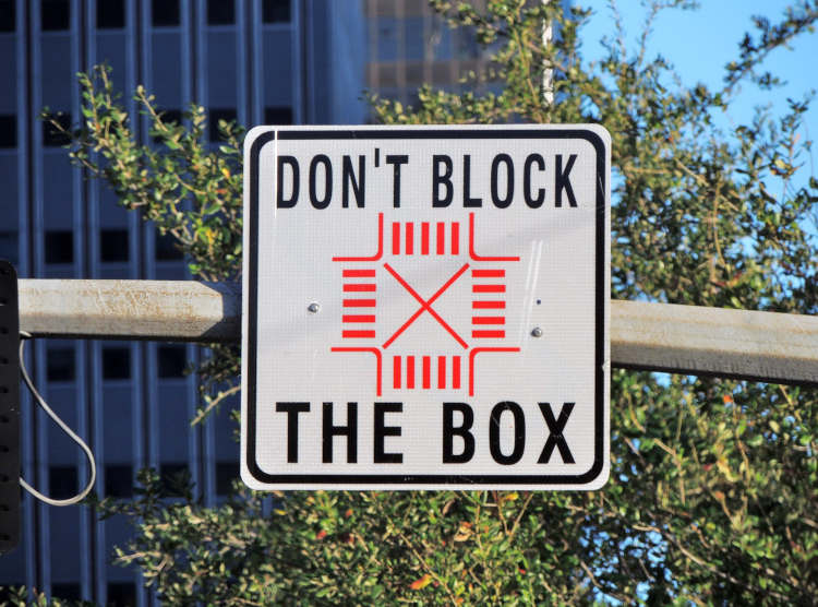  Stop at the edge of the intersection when waiting to make a left hand turn. Just before entering the box.                                                                                                                  