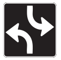 This lane usage sign indicates that left turning vehicles will be proceeding on both sides of the intersection at the same time.