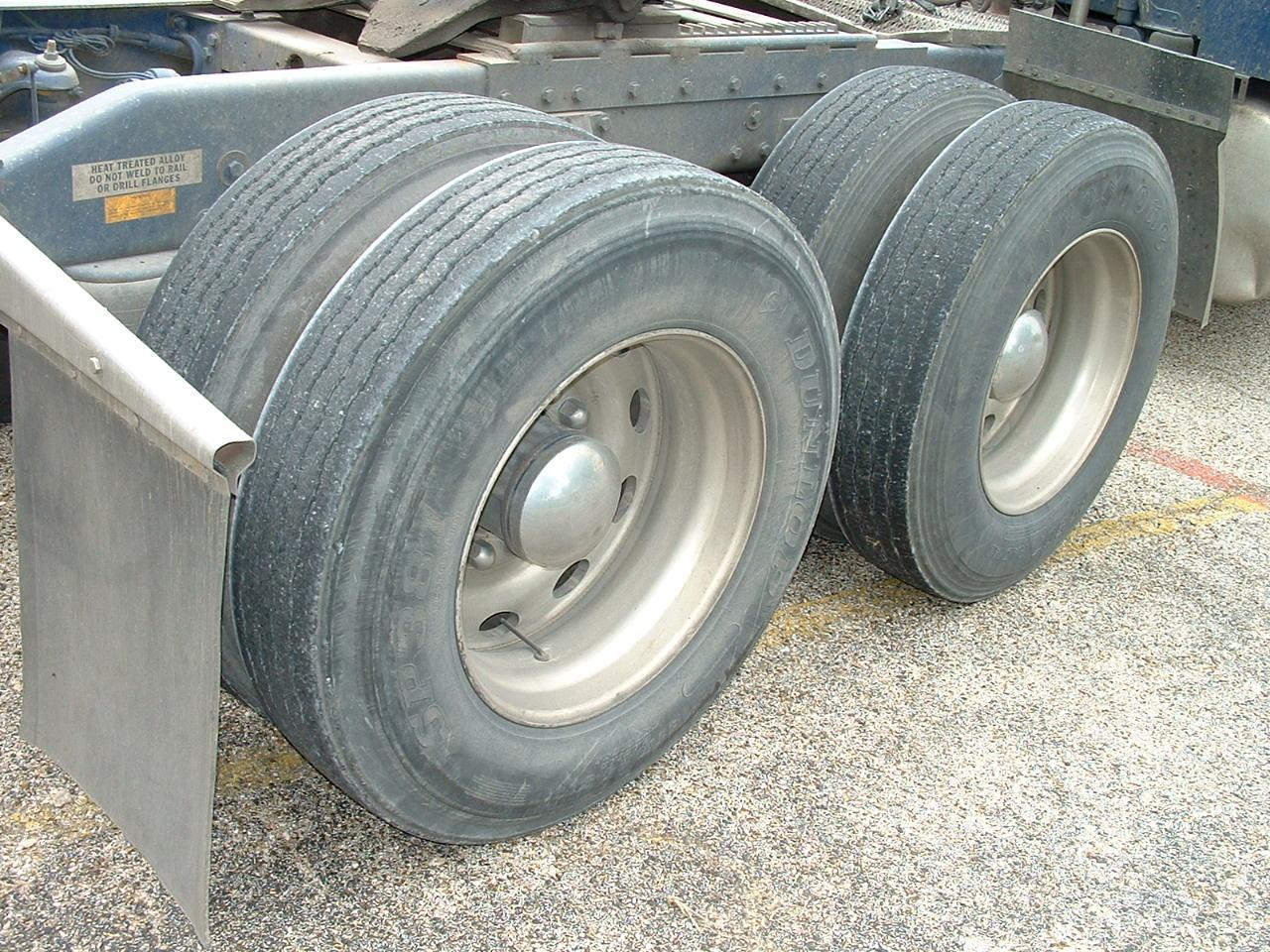 The semi-trailer tires and the tires on the rear of the semi-truck can be re-treads. Steer tires must be new.