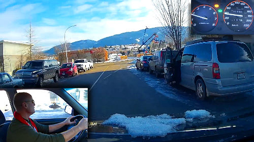 Driver opens car door jeopardizing safety of traffic.