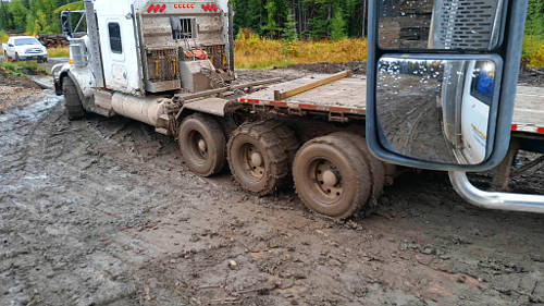 In the spring and the fall, the wet conditions made it mandatory to fit the truck with chains to move through the mud.