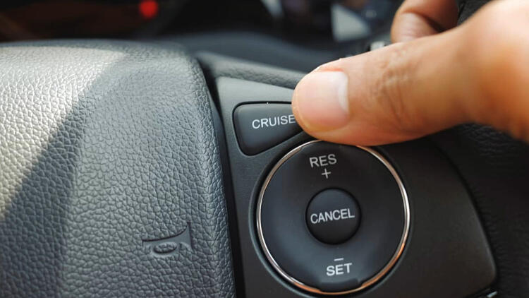 Learn to use cruise control on highways to reduce the distraction of monitoring your speed.