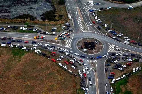 When navigating multi-lane roundabouts, think of it like a conventional intersection to be in the appropriate lane for proceeding straight or turning.<p>Larger vehicles should stay in the outsdie lane.