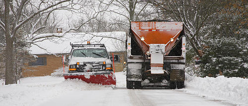 Give winter maintenance vehicles a wide space margin when driving on your test.
